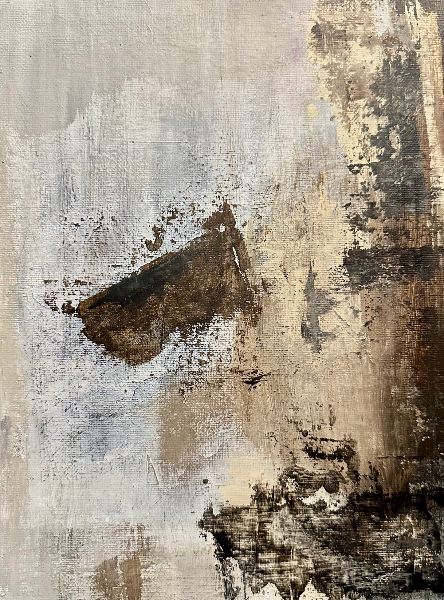 Abstract art with brown, black, and gray textures on a textured background