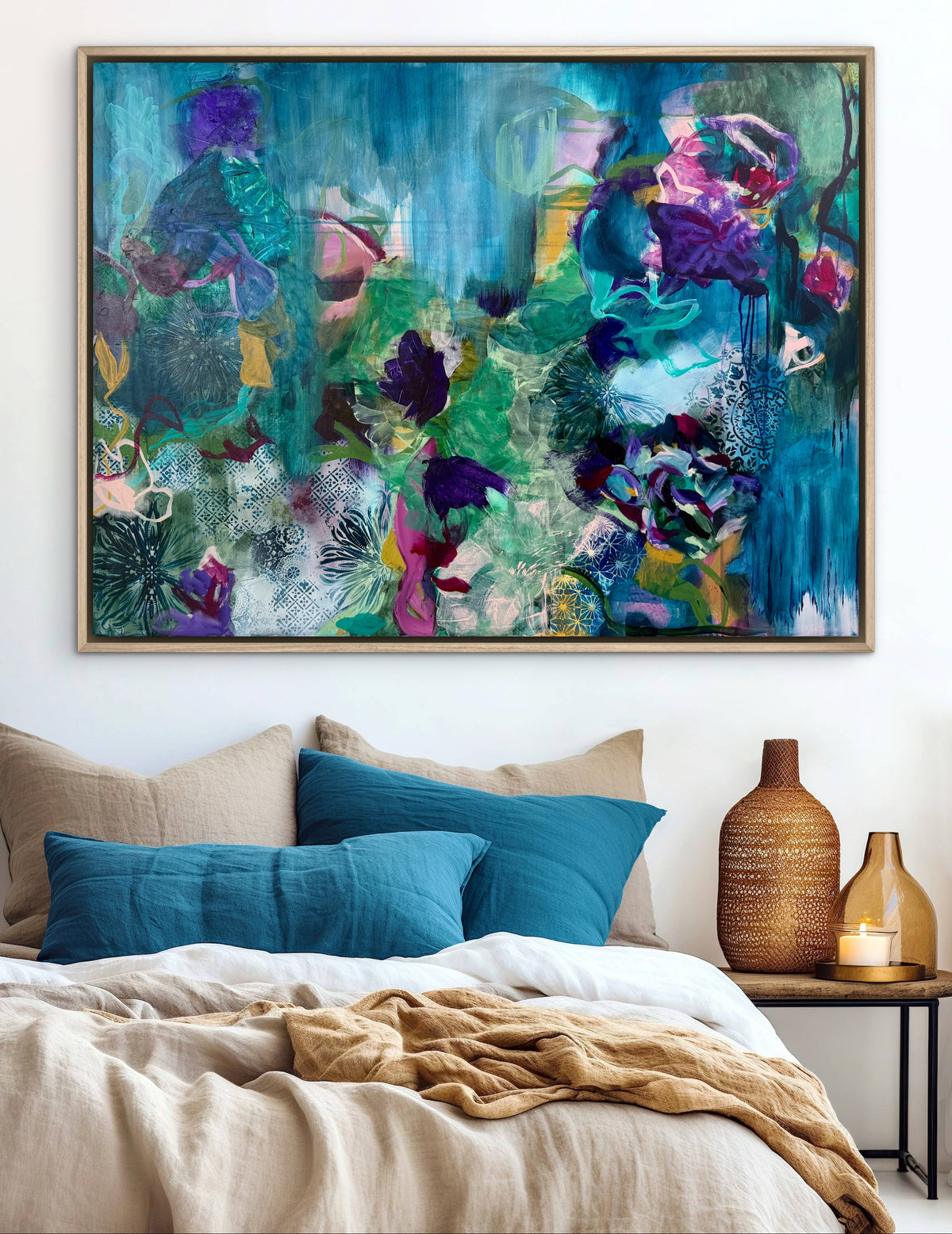 Abstract wall art painting in teal, green, and purple with floral collage details, framed canvas