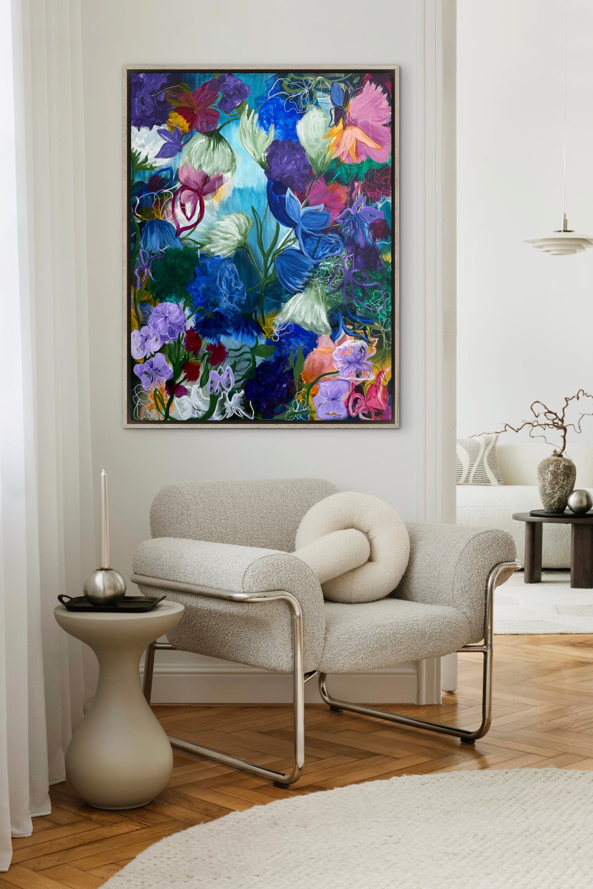 Colorful floral wall art painting in blue, purple and pink with glass-effect details, framed