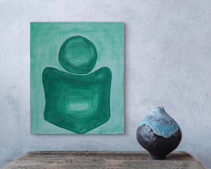 Abstract green painting on a textured wall with a ceramic vase below.