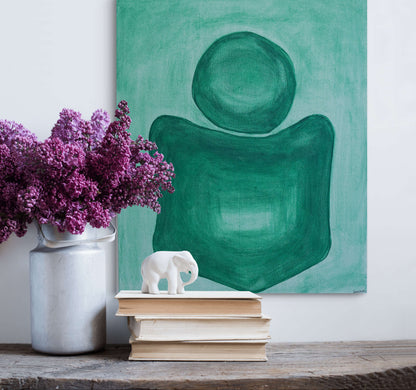 Decorative setup with a vase of purple flowers, books, a white elephant figurine, and a green abstract painting.