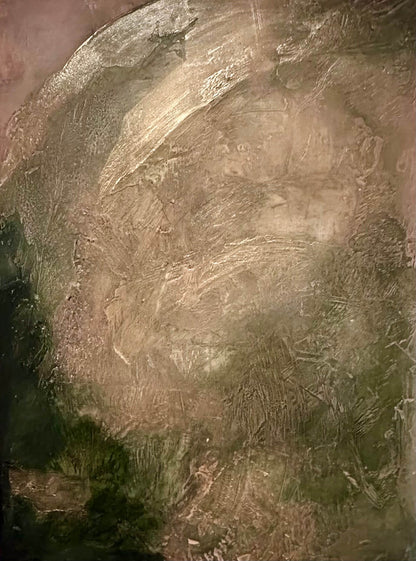 Satellite view of a large desert area with a prominent mountain range.